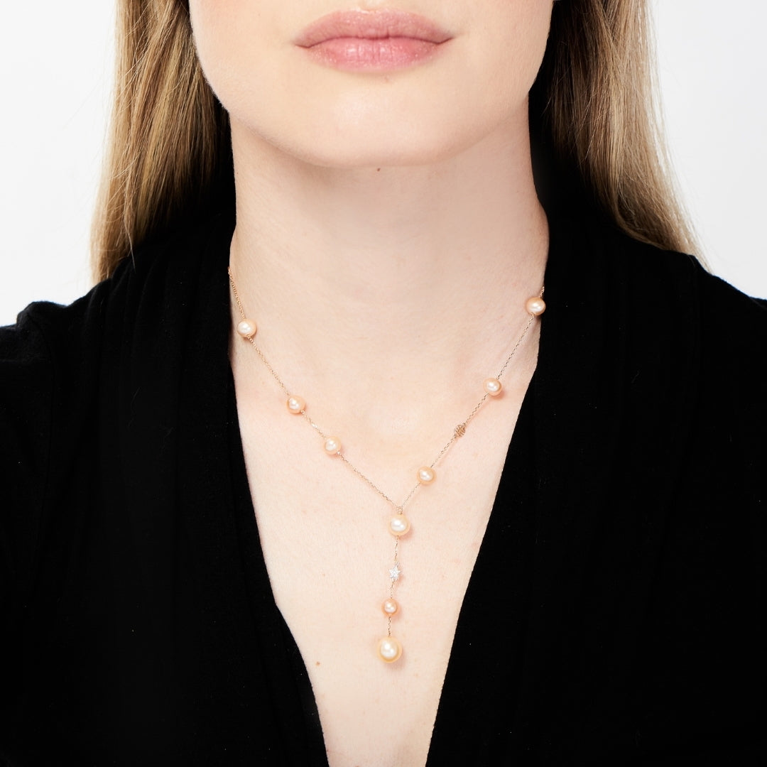 Y-Kette mit rosafarbenen Perlen und Diamantstern