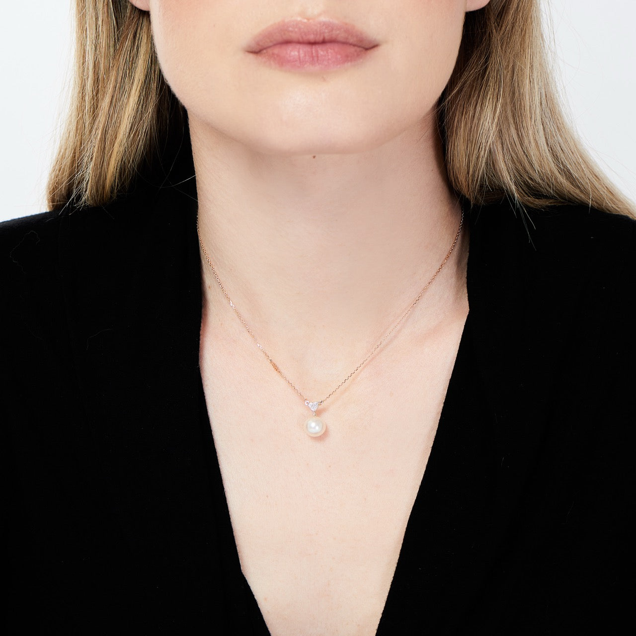 Pendentif avec perle blanche et cœur de diamants