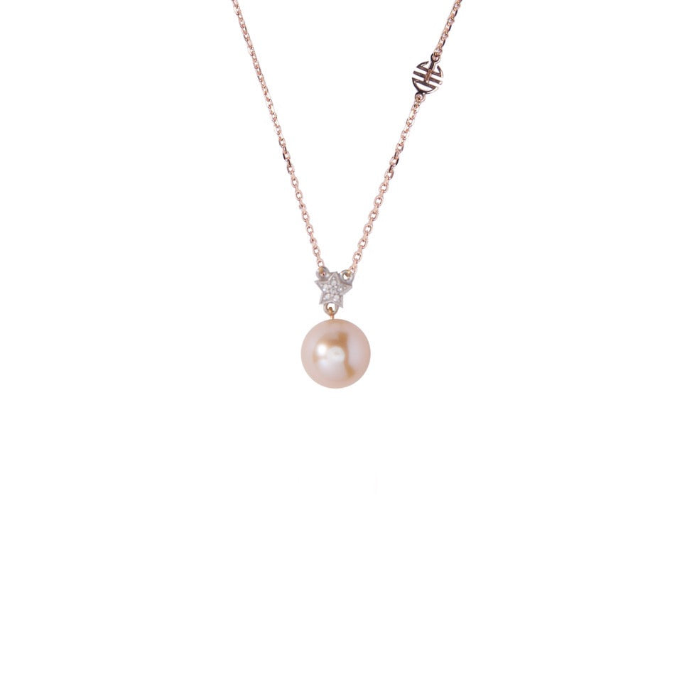 Pendente con perla rosa e stella di diamanti