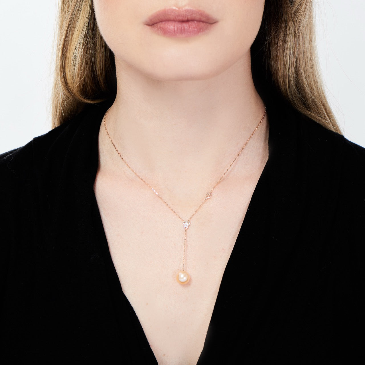 Colar em Y com pérola rosa e estrela de diamantes