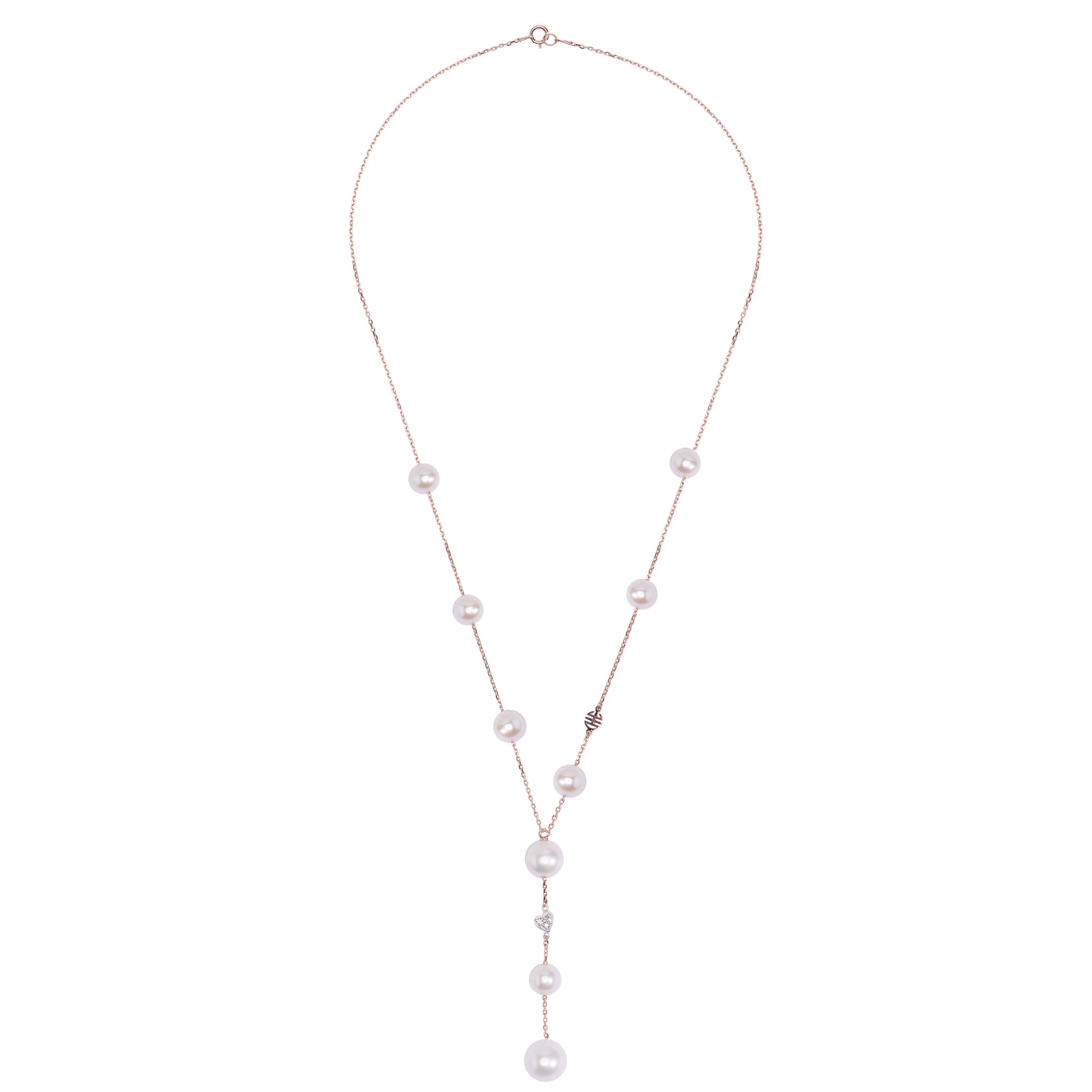 Collana a Y con perle bianche e cuore di diamanti