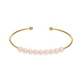 Bangle bracelet with pink pearls