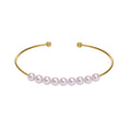 Bangle bracelet with purple pearls
