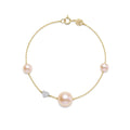 Heart bracelet with pink pearls