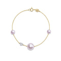 Heart bracelet with purple pearls