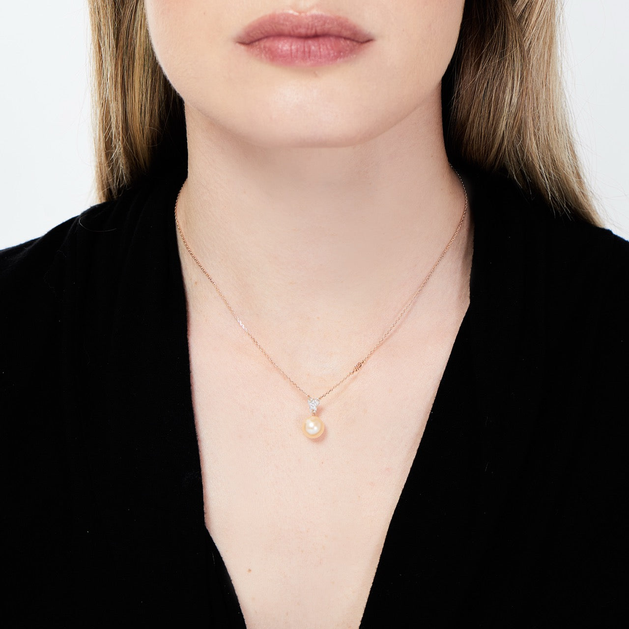 Pendente con perla rosa e stella di diamanti