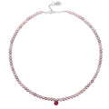 Collana perle viola e doppietta rossa