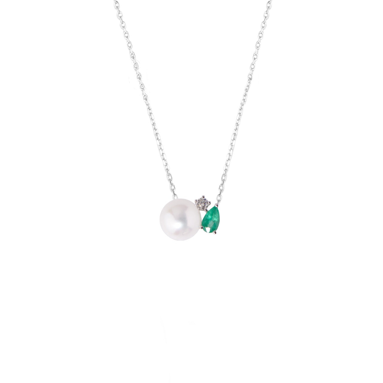 Colgante en Oro Blanco con Diamantes, Perla Akoya y Esmeraldas